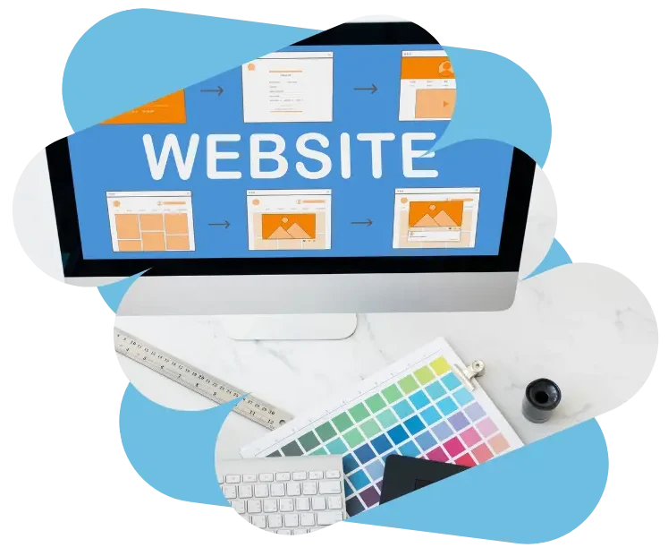 Ecran d'ordinateur affichant la page de création d'un site web et palette de couleur posée sur le bureau.